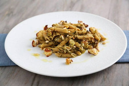 Barilla Protein+™ Penne Recipe with Pesto, Charred Cauliflower, Pine Nuts and Crispy Bacon