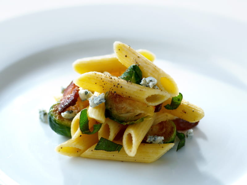Collezione Penne Pasta with Roasted Brussels Sprouts, Bacon, and Gorgonzola Cheese